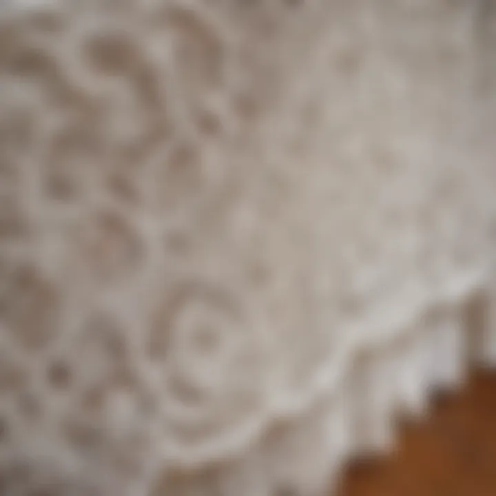 Close-up of lace detailing on a crib skirt